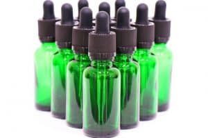green CBD oil glass bottle droppers